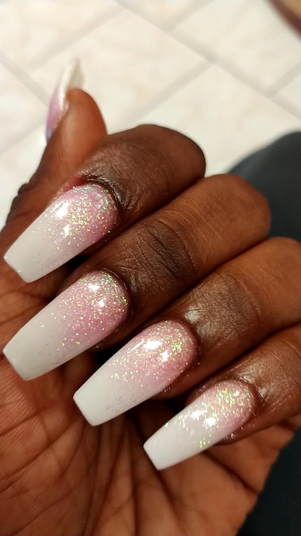 Nail salon interior with manicure stations